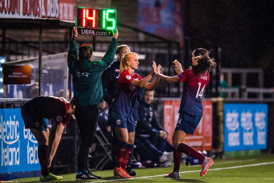 Ingrid Syrstad Engen changes with Amalie Eikeland of Norway