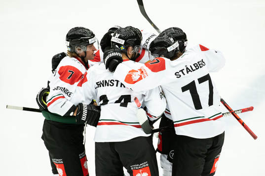Theodor Lennström of Frölunda celebrate with teammates