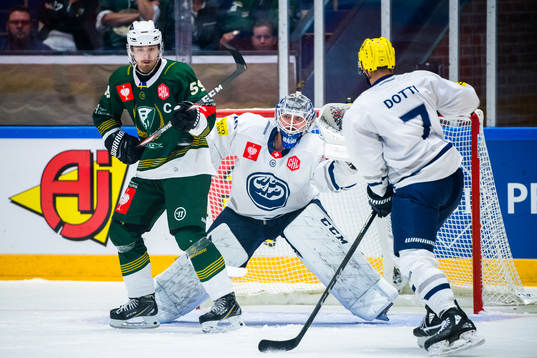 Linus Johansson of Färjestad infront of Goalkeeper Dominik