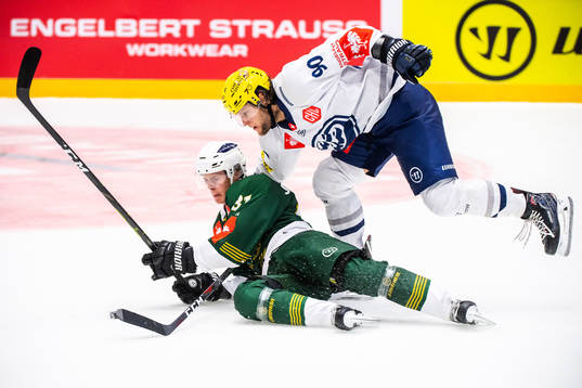 Carl Jakobsson of Färjestad and Jannik Fischer of