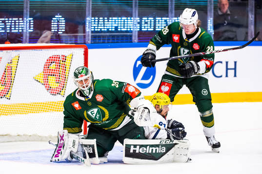 Goalkeeper Markus Svensson and Linus Arnesson of Färjestad
