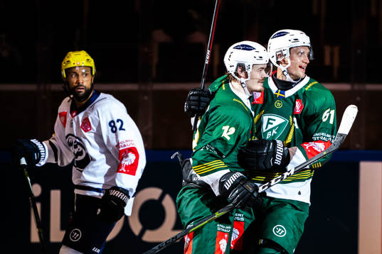 Ville Leskinen and Johan Ryno of Färjestad celebrate