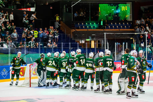 Players of Färjestad celebrate