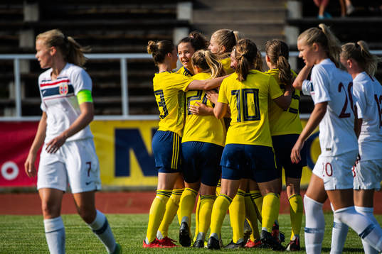 Johanna Alm and Julia Walentowicz of Sweden  celebrate with