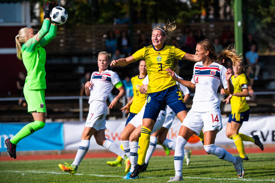 Goalkeeper Hanne Larsen of Norway and Saga Jontoft of Sweden