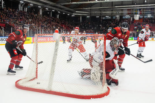 Simon Hjalmarsson and Joel Lundqvist in front of goalkepper