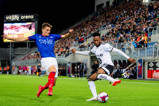 Johan Lædre Bjørdal of Vålerenga and Samuel Adegbenro of