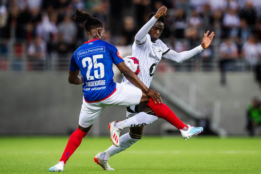 Sam Adekugbe of Vålerenga and Babajide David Akintola of