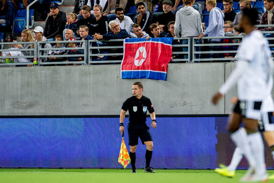 The flag of North Korea in the stands
