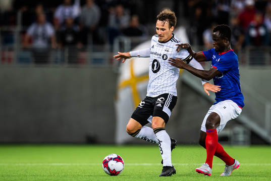 Mike Jensen of Rosenborg and Mohammed Abu of Vålerenga