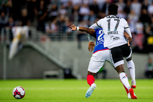 Sam Adekugbe of Vålerenga and Babajide David Akintola of