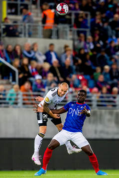 Tore Reginiussen of Rosenborg and Mayron George of