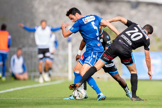 Enric Vallés of Sandefjord and Adrian Berntsen of Sandnes