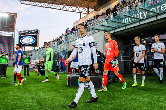 Mike Jensen of Rosenborg enters the pitch