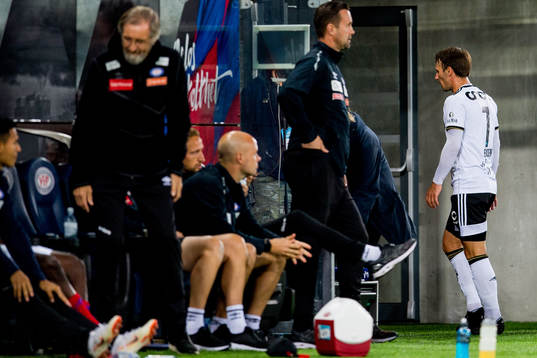 Mike Jensen of Rosenborg walks towards the dressing room