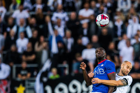 Mayron George of Vålerenga and Tore Reginiussen of