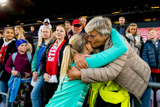 Goalkeeper Ingrid Hjelmseth of Norway with her family