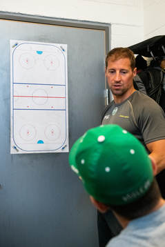 Tränare Cam Abbott och assisterande tränare Cory Murphy
