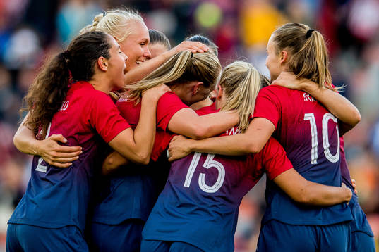 Frida Maanum of Norway celebrates with teammates Ingrid Moe
