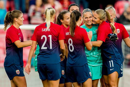 Goalkeeper Ingrid Hjelmseth of Norway with teammates Maren