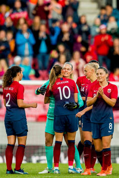 Goalkeeper Ingrid Hjelmseth of Norway with teammate