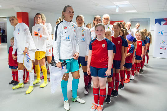 Goalkeeper Ingrid Hjelmseth and Maren Mjelde of Norway