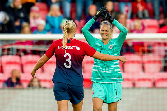 Goalkeeper Ingrid Hjelmseth of Norway with teammate Maria