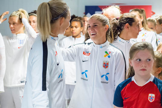Goalkeeper Ingrid Hjelmseth and Maren Mjelde of Norway