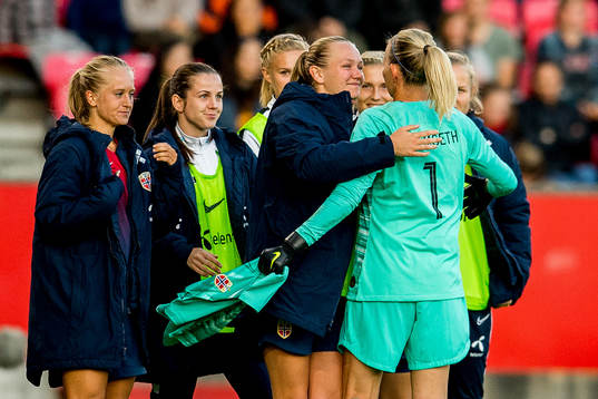 Goalkeeper Ingrid Hjelmseth of Norway with teammate Frida