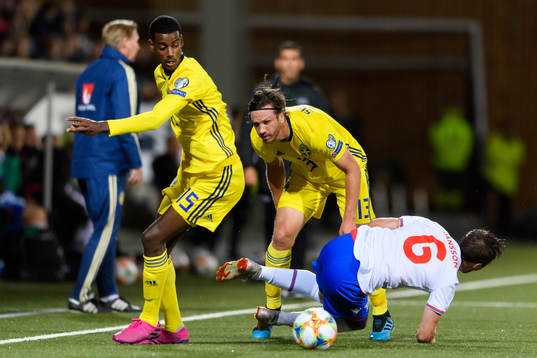 Alexander Isak and Gustav Svensson of Sweden against Hallur