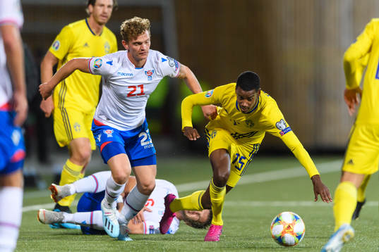 Meinhard Olsen of Faroe Islands and Alexander Isak of Sweden