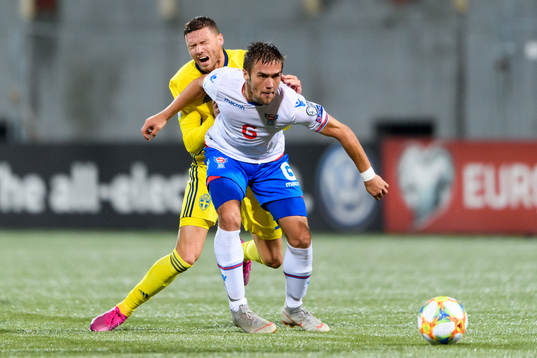 Marcus Berg of Sweden in a situation with Jakob Johansson