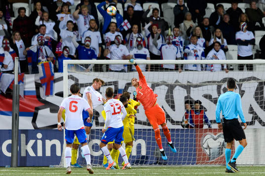 Goalkeeper Robin Olsen of Sweden saves a shot
