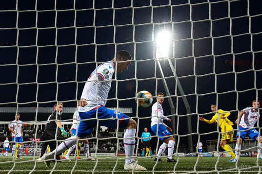 Atli Gregersen of Faroe Islands saves a shot from Robin
