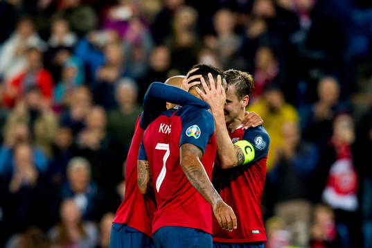 Joshua King of Norway celebrates with teammate Stefan