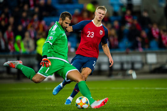 Henry Bonello of Malta and Erling Braut  Haaland of Norway