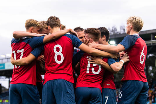 Tobias Heintz of Norway celebrates with teammates