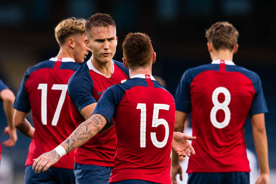 Tobias Heintz of Norway celebrates with teammate Leo Skiri
