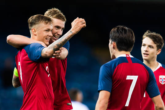 Kristian Thorstvedt of Norway celebrates with teammates