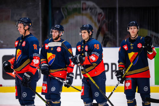 Michael Haga of Djurgården look dejected with teammates