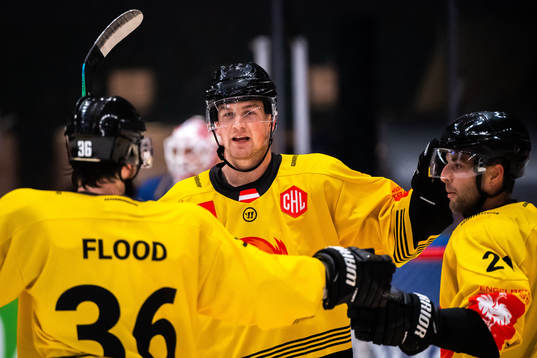 CJ Stretch of Vienna Capitals celebrate with teammates
