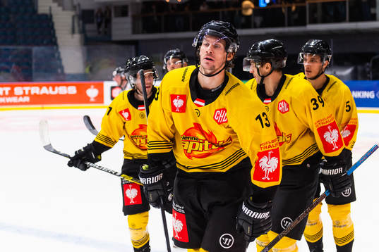 Sondre Olden of Vienna Capitals celebrates