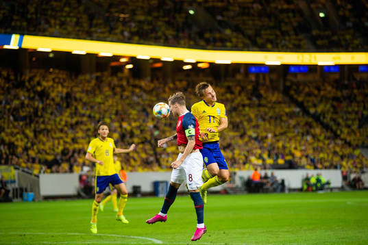 Stefan Johansen of Norway and Pierre Bengtsson of Sweden
