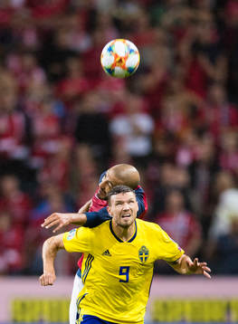 Marcus Berg of Sweden battles for the ball with Haitam