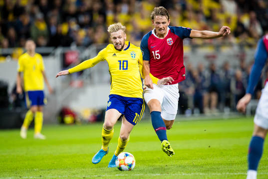 Emil Forsberg of Sweden battles for the ball with Sander