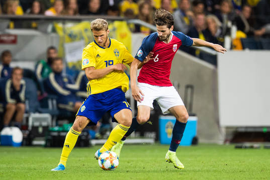 Sebastian Andersson of Sweden and Håvard Nordtveit of
