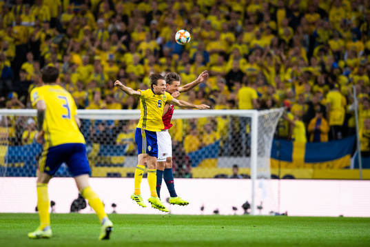 Albin Ekdal of Sweden and Sander Berge of Norway compete