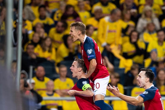 Stefan Johansen celebrate with Martin Ødegaard of Norway