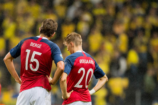 Sander Berge and Martin Ødegaard of Norway look dejected