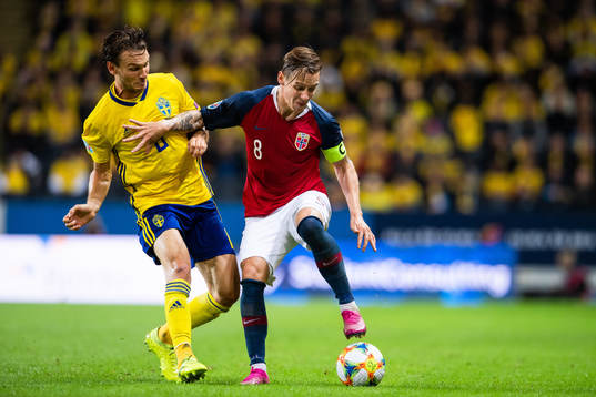 Albin Ekdal of Sweden and Stefan Johansen of Norway